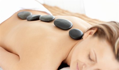 simsearch:400-04192063,k - Relaxed woman with hot stones on her back in a Spa center Stock Photo - Budget Royalty-Free & Subscription, Code: 400-04203655