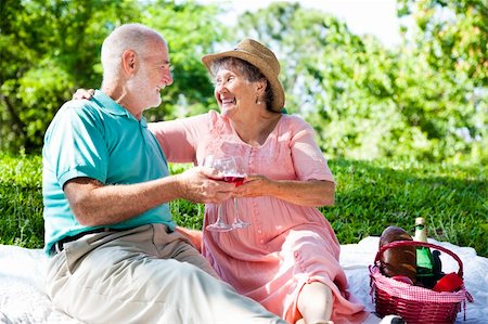 simsearch:400-04208630,k - Romantic senior couple giving a toast on an outdoor picnic. Stock Photo - Budget Royalty-Free & Subscription, Code: 400-04203916