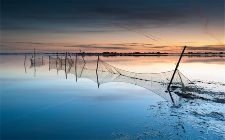 nets a quiet morning at sunrise Stock Photo - Budget Royalty-Free & Subscription, Code: 400-04218215