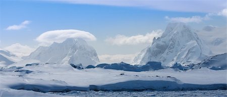 simsearch:400-04299237,k - Beautiful snow-capped mountains against the blue sky Stock Photo - Budget Royalty-Free & Subscription, Code: 400-04219414