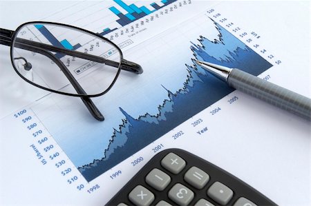 picsfive (artist) - close up of stock market chart, glasses, calculator and pen Stock Photo - Budget Royalty-Free & Subscription, Code: 400-04210245