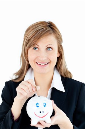 simsearch:400-04184165,k - Caucasian woman putting money in a piggybank against white background Stock Photo - Budget Royalty-Free & Subscription, Code: 400-04210522