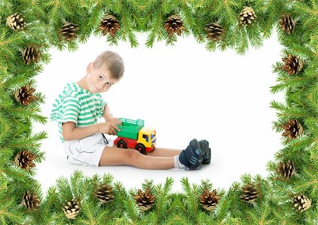 Christmas framework with boy isolated on white background Stock Photo - Budget Royalty-Free & Subscription, Code: 400-04211931