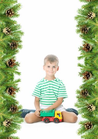 Christmas framework with boy isolated on white background Stock Photo - Budget Royalty-Free & Subscription, Code: 400-04211932