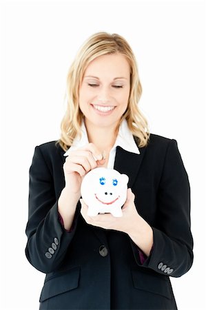 simsearch:400-04184165,k - Caucasian woman putting money in a piggybank against a white background Stock Photo - Budget Royalty-Free & Subscription, Code: 400-04212326