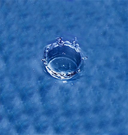 simsearch:400-05275951,k - detail of water drop and splash with blue background Stock Photo - Budget Royalty-Free & Subscription, Code: 400-04212640