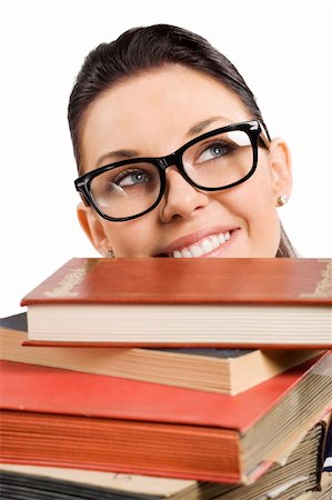 simsearch:400-04860880,k - pretty student with big glasses coming up with hr face from a pile of book Stock Photo - Budget Royalty-Free & Subscription, Code: 400-04213414