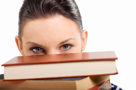 simsearch:400-04860880,k - pretty student with big glasses playing and hiding her face behind a pile of book Stock Photo - Budget Royalty-Free & Subscription, Code: 400-04213415