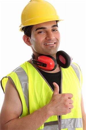 Smiling builder, construction worker or other trades man showing a  thumbs up sign. White background. Stock Photo - Budget Royalty-Free & Subscription, Code: 400-04227542