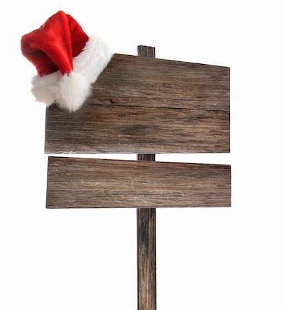 simsearch:400-04229535,k - Weathered wooden sign with santa hat on white background Photographie de stock - Aubaine LD & Abonnement, Code: 400-04229537