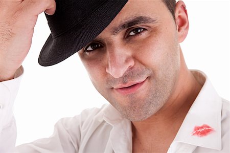 simsearch:400-05694115,k - seductive man greeting with his hat, the shirt with lipstick mark Stock Photo - Budget Royalty-Free & Subscription, Code: 400-04220490