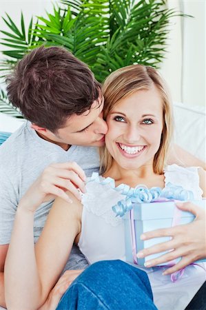 simsearch:400-04739802,k - Pleased woman receive a present from her boyfriend Stock Photo - Budget Royalty-Free & Subscription, Code: 400-04220788