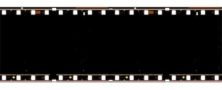 simsearch:400-05102933,k - Closeup of old 35 mm movie Film reel Stock Photo - Budget Royalty-Free & Subscription, Code: 400-04222260
