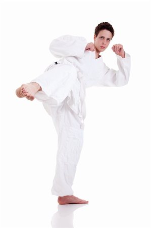 simsearch:400-04347301,k - kick ok martial art, isolated on a white background: - sports exercise Photographie de stock - Aubaine LD & Abonnement, Code: 400-04222731