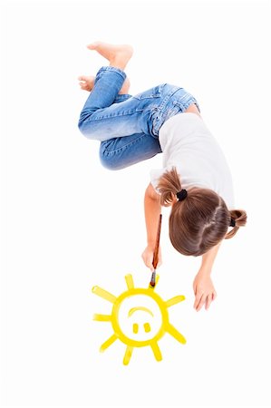 simsearch:644-01630853,k - Top view of a happy girl lying on floor and painting a happy sun Stock Photo - Budget Royalty-Free & Subscription, Code: 400-04234032