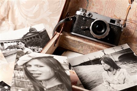 suitcase old - Black & white photos of a young girl from an old suitcase Stock Photo - Budget Royalty-Free & Subscription, Code: 400-04235021