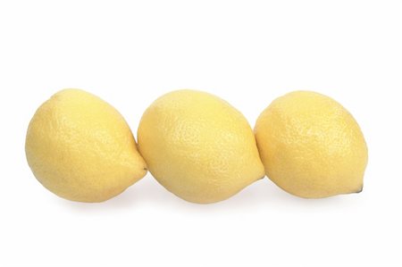 simsearch:400-04716078,k - Juicy ripe lemons isolated on white background Stock Photo - Budget Royalty-Free & Subscription, Code: 400-04235369