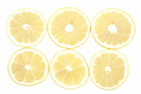 simsearch:400-04716078,k - Juicy ripe lemons isolated on white background Stock Photo - Budget Royalty-Free & Subscription, Code: 400-04235370