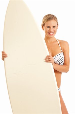 Portrait of young woman holding surfboard Stock Photo - Budget Royalty-Free & Subscription, Code: 400-04236974