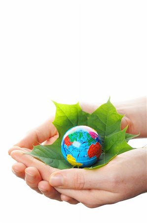 simsearch:400-05365649,k - save the world concept with hand leaf and globe Stock Photo - Budget Royalty-Free & Subscription, Code: 400-04237570