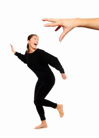 people running scared - A picture of young woman running away from big hand, a lot of concepyual meanings Stock Photo - Budget Royalty-Free & Subscription, Code: 400-04237856
