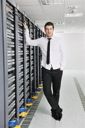 simsearch:400-04239432,k - young handsome business man  engeneer in datacenter server room Stock Photo - Budget Royalty-Free & Subscription, Code: 400-04239417