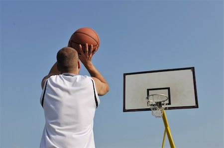 basketball player practicing and posing for basketball and sports athlete concept Stock Photo - Budget Royalty-Free & Subscription, Code: 400-04239516