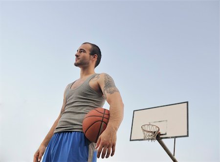 basketball player practicing and posing for basketball and sports athlete concept Stock Photo - Budget Royalty-Free & Subscription, Code: 400-04239512