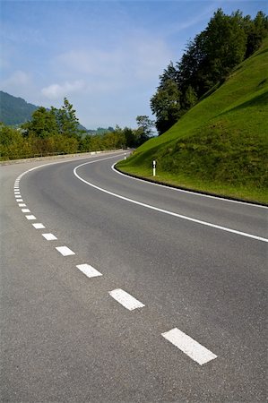 simsearch:400-05112302,k - Picture of empty european countryside road turn Stock Photo - Budget Royalty-Free & Subscription, Code: 400-04239568