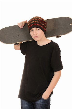 The teenager with a skateboard and in a hat isolated on white background Foto de stock - Super Valor sin royalties y Suscripción, Código: 400-04230709