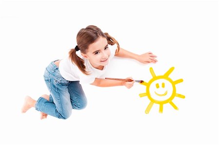 simsearch:644-01630853,k - Top view of a happy girl lying on floor and painting a happy sun Stock Photo - Budget Royalty-Free & Subscription, Code: 400-04230862