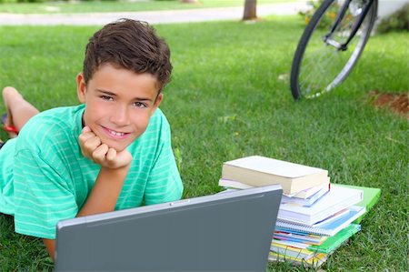 simsearch:400-04704759,k - boy teenager homework studying laying green grass garden bycicle background Stock Photo - Budget Royalty-Free & Subscription, Code: 400-04231373