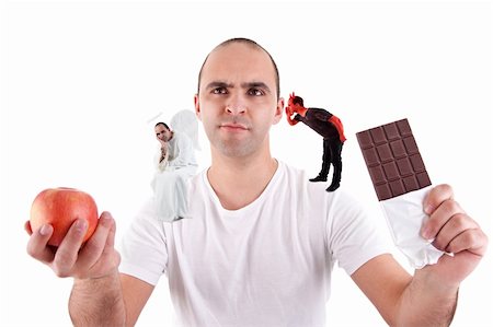 simsearch:400-05106591,k - young man torn between eating an apple and a chocolate,between the devil and angel, on white Stock Photo - Budget Royalty-Free & Subscription, Code: 400-04231410