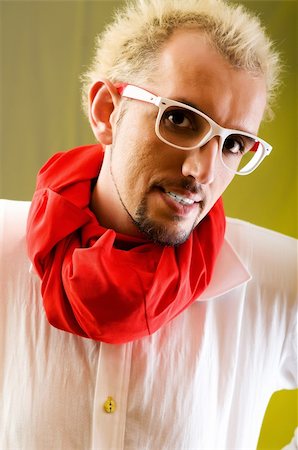 simsearch:400-04748544,k - Man with red scarf against coloured background Stock Photo - Budget Royalty-Free & Subscription, Code: 400-04241329