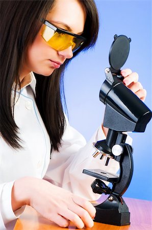 simsearch:400-05669968,k - Woman scientist working in the lab Stock Photo - Budget Royalty-Free & Subscription, Code: 400-04241882