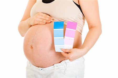 simsearch:400-04798379,k - Pregnant woman holding colour paint samples isolated on white. Close-up. Stock Photo - Budget Royalty-Free & Subscription, Code: 400-04243290