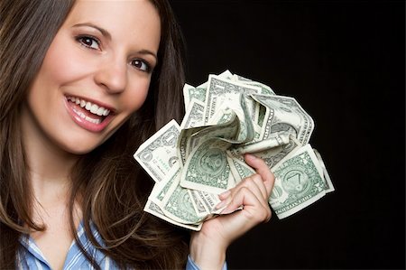 Beautiful smiling woman holding money Stock Photo - Budget Royalty-Free & Subscription, Code: 400-04257816
