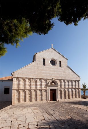 An old stone cathedral on the Island of Rab, Croatia - The Cathedral of the Holy Virgin Mary's Assumption Stock Photo - Budget Royalty-Free & Subscription, Code: 400-04258419