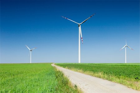 wind turbines and empty country road Stock Photo - Budget Royalty-Free & Subscription, Code: 400-04258724