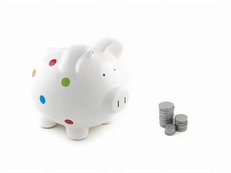 simsearch:400-06077471,k - A piggy bank isolated against a white background Stock Photo - Budget Royalty-Free & Subscription, Code: 400-04259435