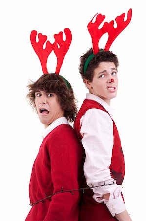 happy young men wearing reindeer horns, arrested in Christmas lights Stock Photo - Budget Royalty-Free & Subscription, Code: 400-04264222