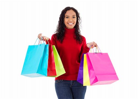 spree - Stock image of cheerful woman holding shopping bags over white background Stock Photo - Budget Royalty-Free & Subscription, Code: 400-04266795