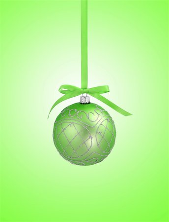 simsearch:400-05693036,k - Green christmas ball with ribbon on green background with copy space for text Stock Photo - Budget Royalty-Free & Subscription, Code: 400-04268307