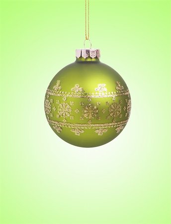 simsearch:400-05693036,k - Green christmas ball with ribbon on green background with copy space for text Stock Photo - Budget Royalty-Free & Subscription, Code: 400-04268313
