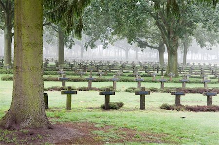 simsearch:400-04032243,k - crosses at cemetery in autumn mist stone tombstones Stock Photo - Budget Royalty-Free & Subscription, Code: 400-04260898