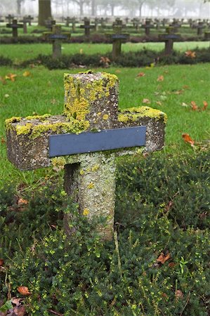 simsearch:400-04032243,k - crosses at cemetery in autumn mist stone tombstones Stock Photo - Budget Royalty-Free & Subscription, Code: 400-04260899