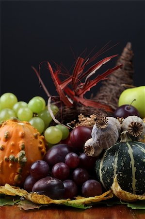 pumpkin fruit and his leafs - Autumn cornucopia - symbol of food and abundance Stock Photo - Budget Royalty-Free & Subscription, Code: 400-04262100