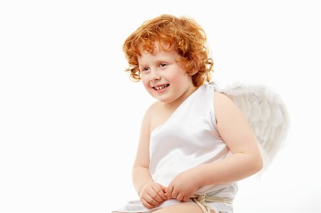 Cheerful little boy in an image of the cupid, isolated on a white background Stock Photo - Budget Royalty-Free & Subscription, Code: 400-04262981