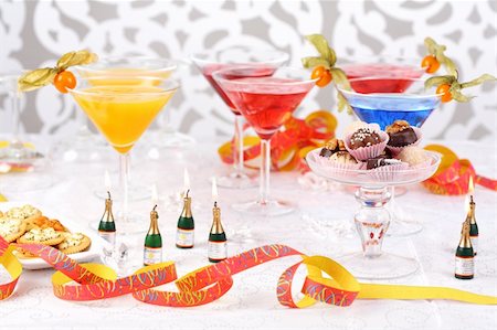 Sweet pralines and coctails birthday party or carnival Stock Photo - Budget Royalty-Free & Subscription, Code: 400-04263149