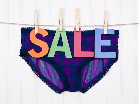 simsearch:400-04263617,k - Vibrant Image for Your Next SALE Purple Panties. Photographie de stock - Aubaine LD & Abonnement, Code: 400-04263617